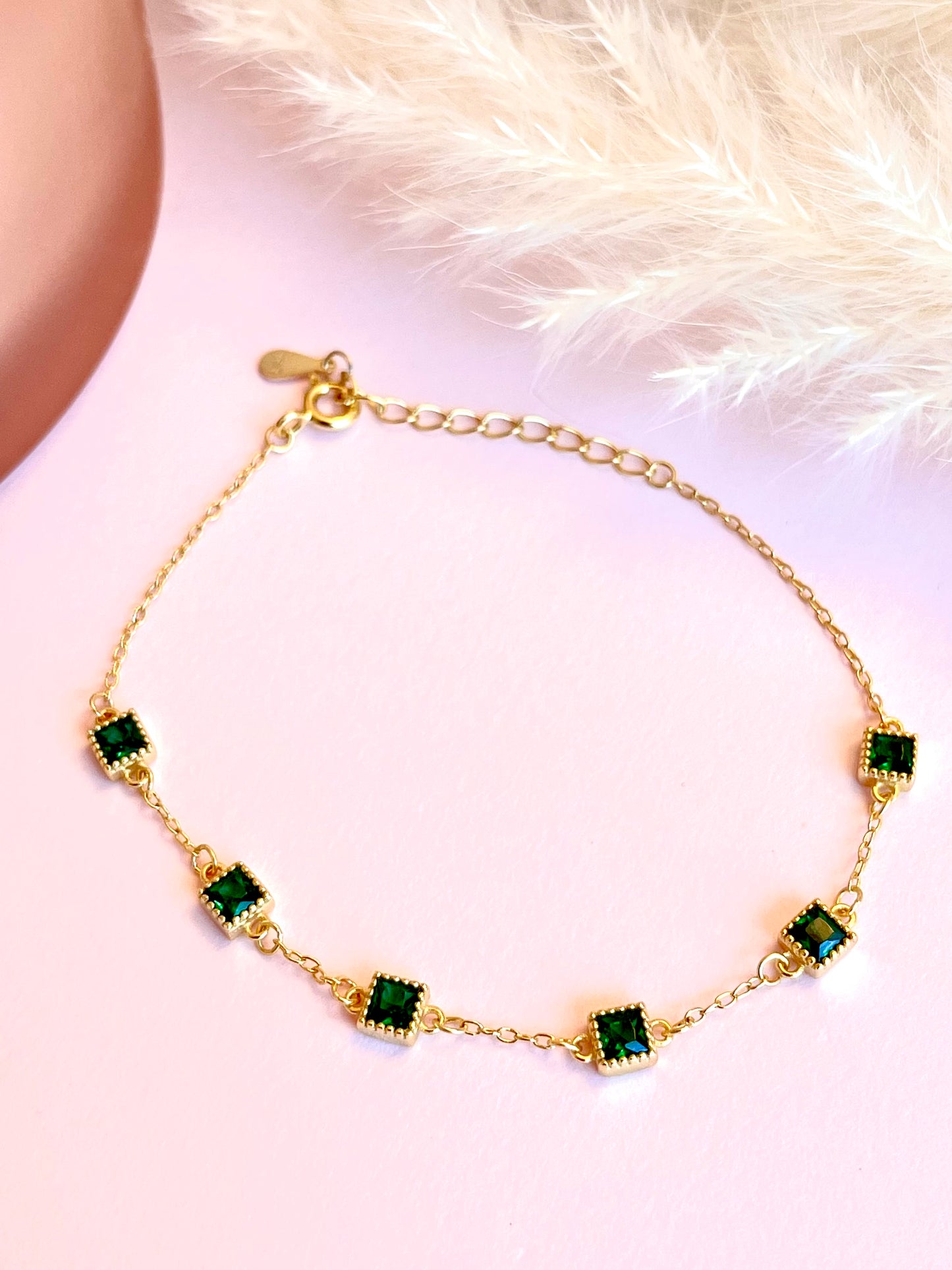 gold green bracelet